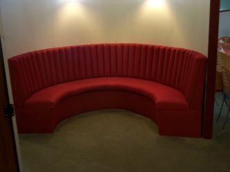 Fixed seating D shaped fluted back style booth. Designed & Manufactured by Suite Illusions 